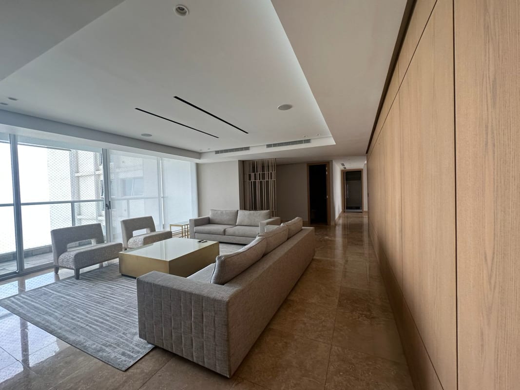 Master bedroom featuring floor-to-ceiling ocean panorama, marble floors, luxury finishes at PH Q Tower