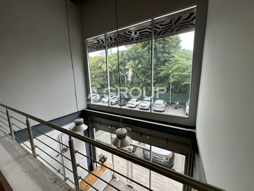 Bathroom in commercial unit with rustic barn door and modern fixtures Plaza SF69 Panama