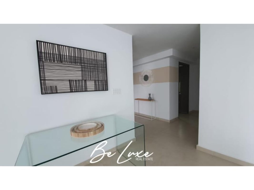 Bedroom featuring large windows, built-in closets, ocean view in PH Lumiere Costa del Este Panama City