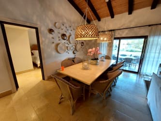 Bright living room with natural light, sofa set & garden view in luxury Buenaventura villa
