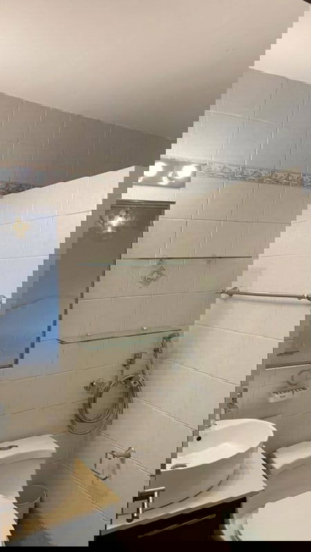 Updated bathroom with modern tile and walk-in shower PH Obarrio Panama