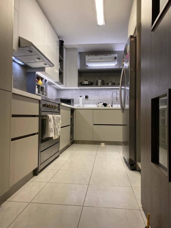 Apartment kitchen with granite counters modern cabinetry in PH Obarrio Panama City