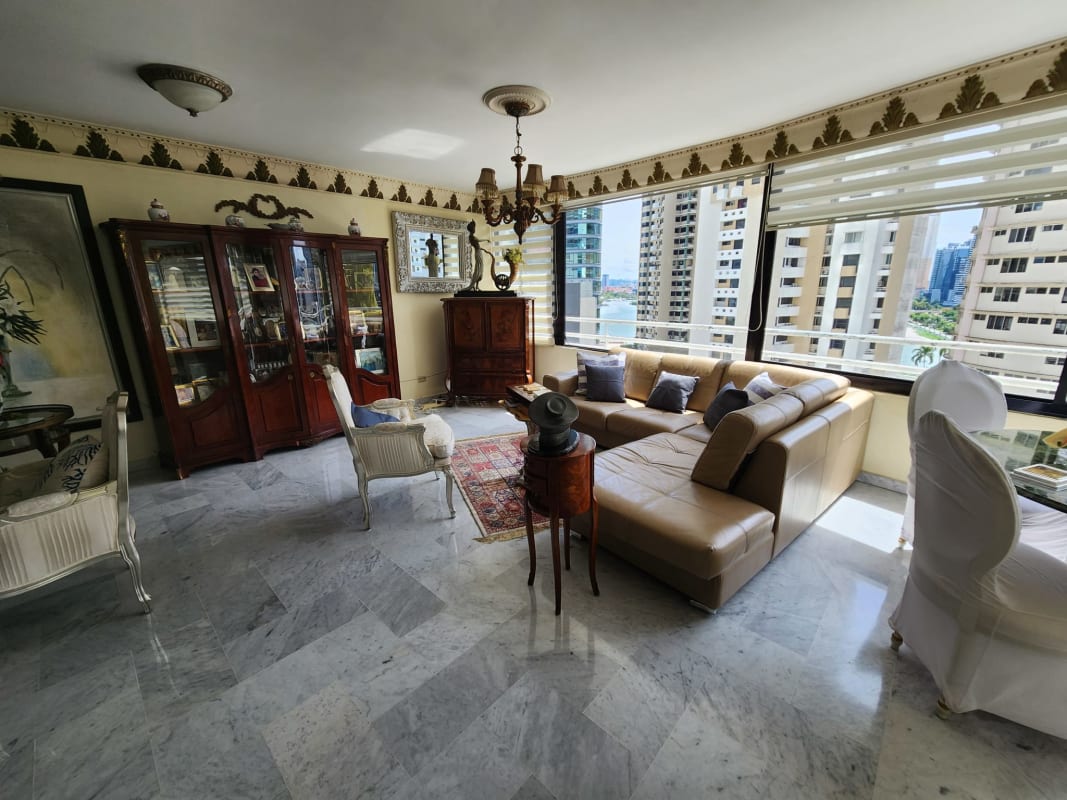 Outdoor swimming pool with lounge chairs in luxury PH Torre Paitilla Punta Paitilla Panama City