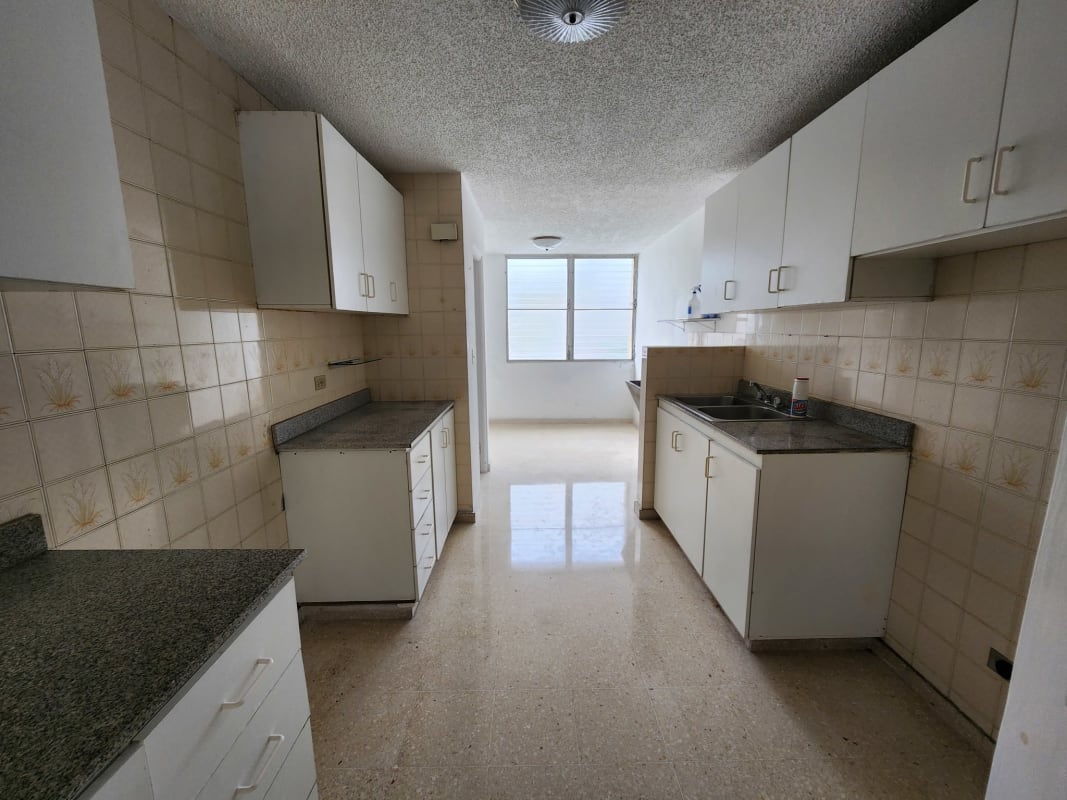 Bathroom featuring shower tiled walls vanity and window PH La Alameda apartment