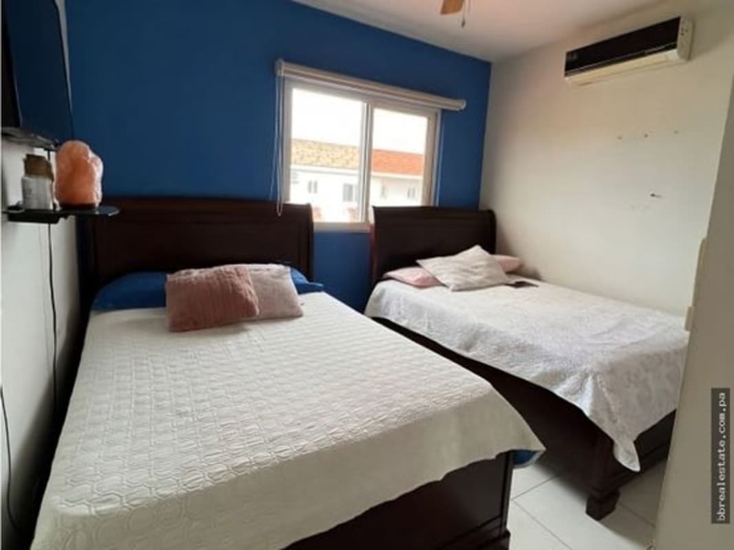 Large open living dining room with ceramic tile floors, sliding door to patio in Las Acacias Panama