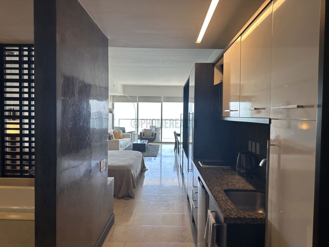 Elegant marble luxury bathroom with rainfall shower in studio at JW Marriott Panama