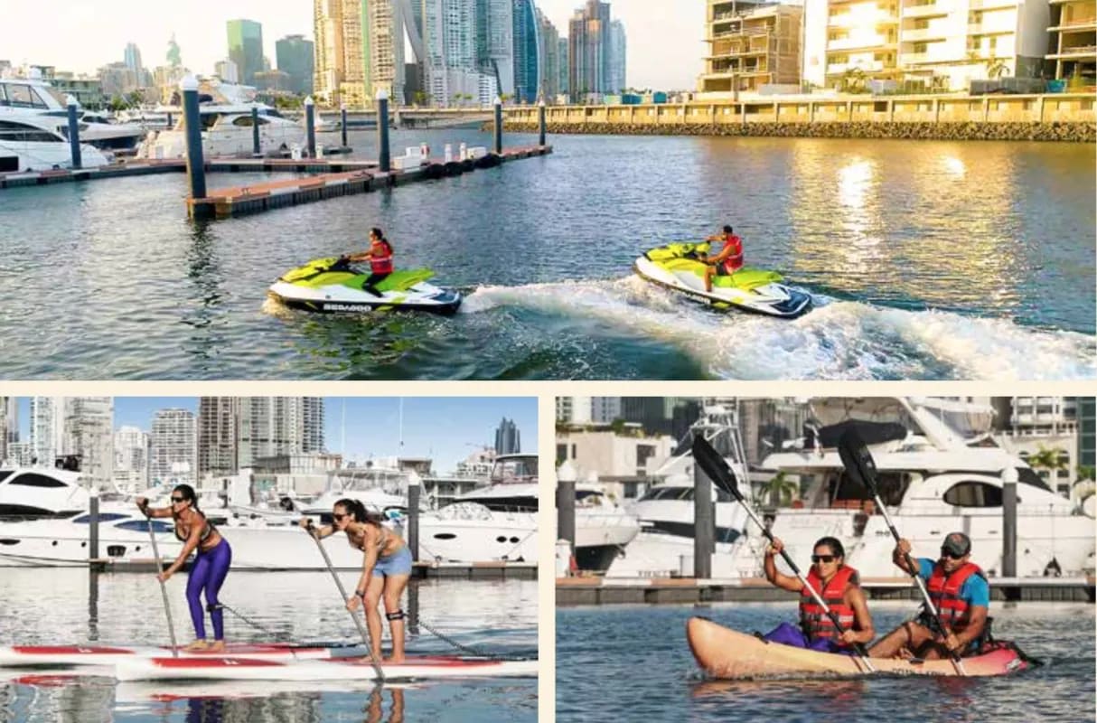 Private marina with jet skis, kayaks, paddleboards and city skyline