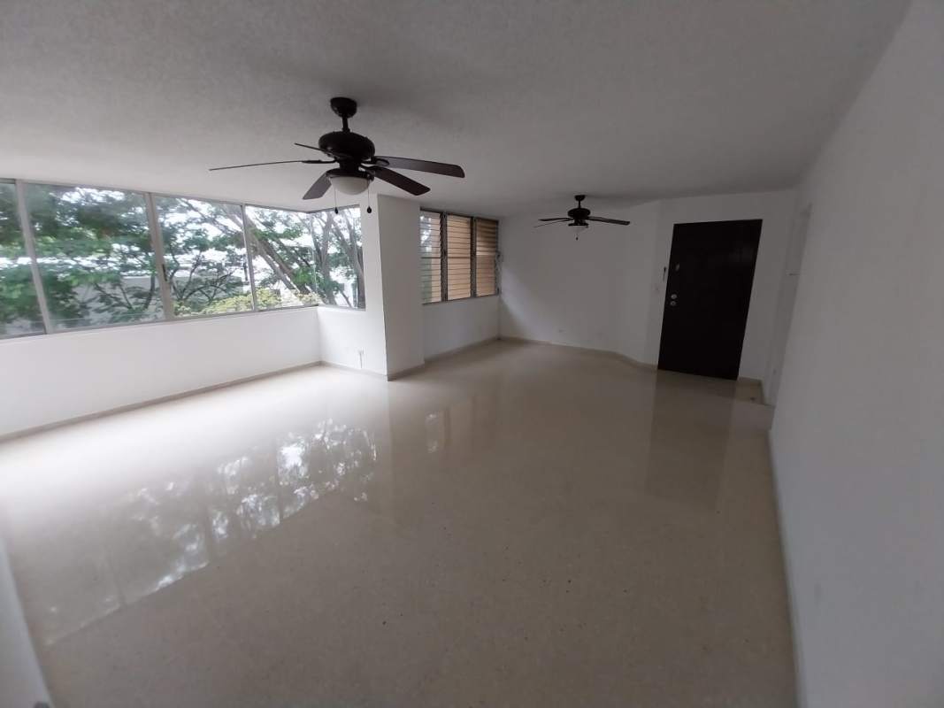 Bedroom with builtin closet and ceiling fan in PH La Alameda Panama City