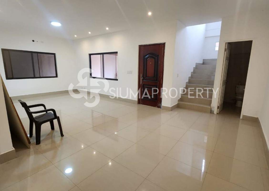 Open-concept bright living and dining area tiled floor two-story house Las Acacias Panama