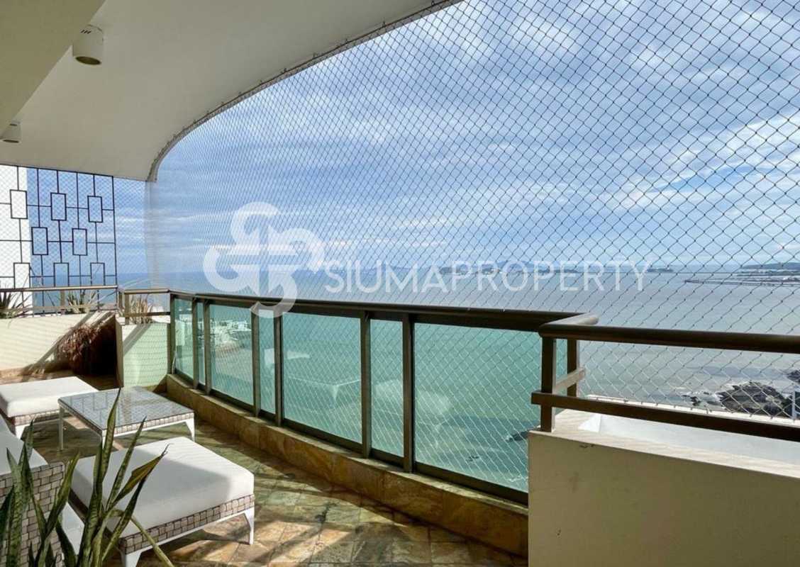 Modern balcony with glass railing, lounge chairs and Pacific Ocean views in PH Ocean Park Punta Pacifica Panama