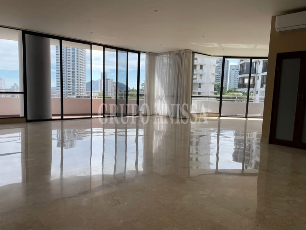 Large living room with marble floors and panoramic windows PH La Cresta Palace Panama
