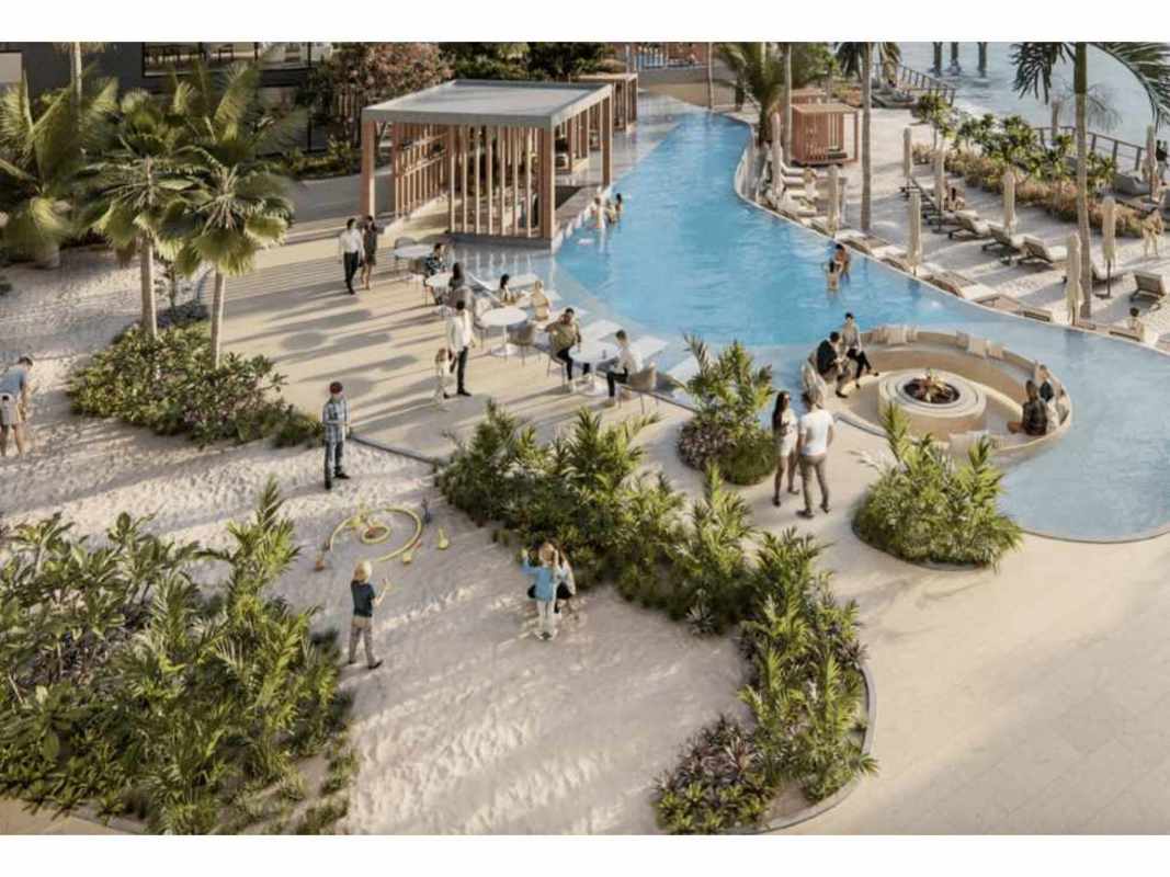 Luxury waterfront property with pools, lounging areas and city skyline views on Ocean Reef Panama