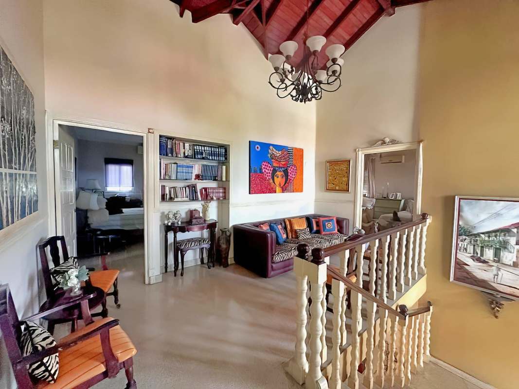 Spacious master bedroom vaulted ceiling arched doorway La Alameda Panama