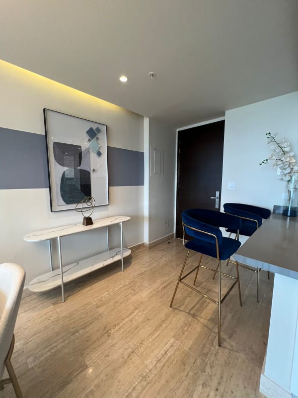 Sleek open kitchen with quartz counters and appliances at PH Paramount Costa del Este Panama