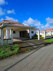 Spacious empty living room with tiled floor, large windows, sliding glass door at Coquito Hill David