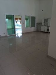 Wraparound covered terrace with tile floor in Coquito Hill David Panama