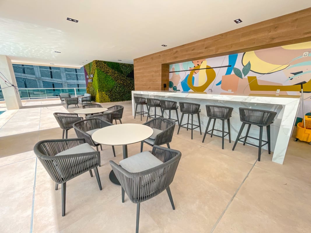 Urban outdoor lounge, poolside bar, murals, social amenities PH La Loma Panama