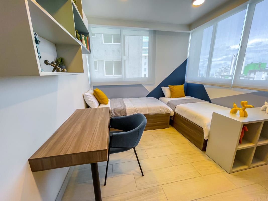 Bright bedroom with large window, air conditioning, city view PH La Loma Panama