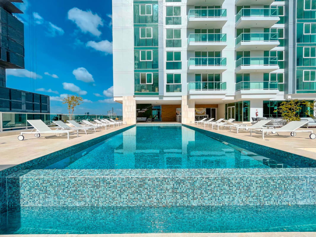 Rooftop infinity pool with city skyline, PH La Loma Hato Pintado