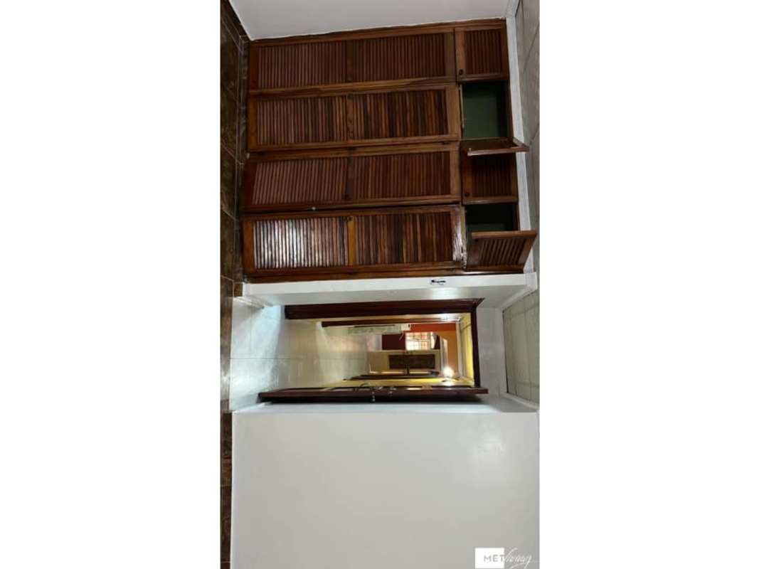 Exterior with metal security gate, tiled patio, decorative wall in Altos de Plaza Tocumen Panama