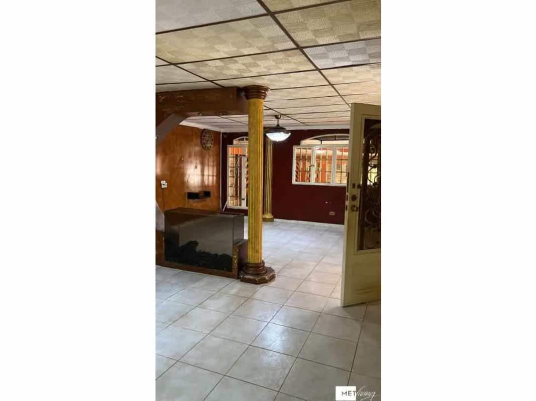 Interior entry with stone wall, decorative tile floor, metal security door in Altos de Plaza Tocumen Panama