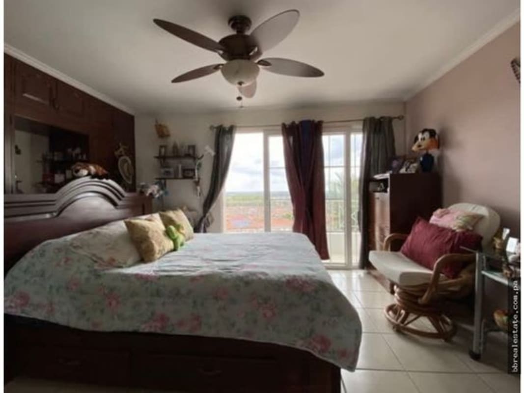 Bedroom with balcony, ceiling fan, built-in closet, and tiled floor Brisas del Golf Panama
