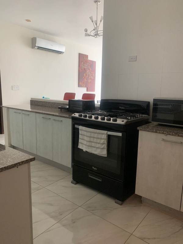 Modern bathroom granite countertop glass shower PH Cosmopolitan Via Porras Panama City