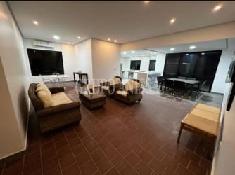 Outdoor covered gazebo with BBQ grill and pool at Coronado home for sale