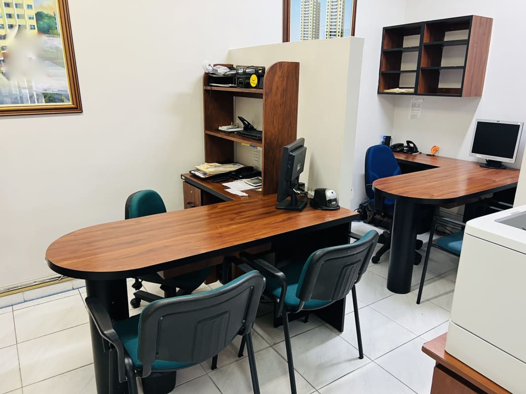 Shared open workspace with desks and computers Parque Lefevre Panama