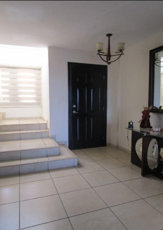 Bedroom with large window scenic mountain view in Brisas Heights Panama