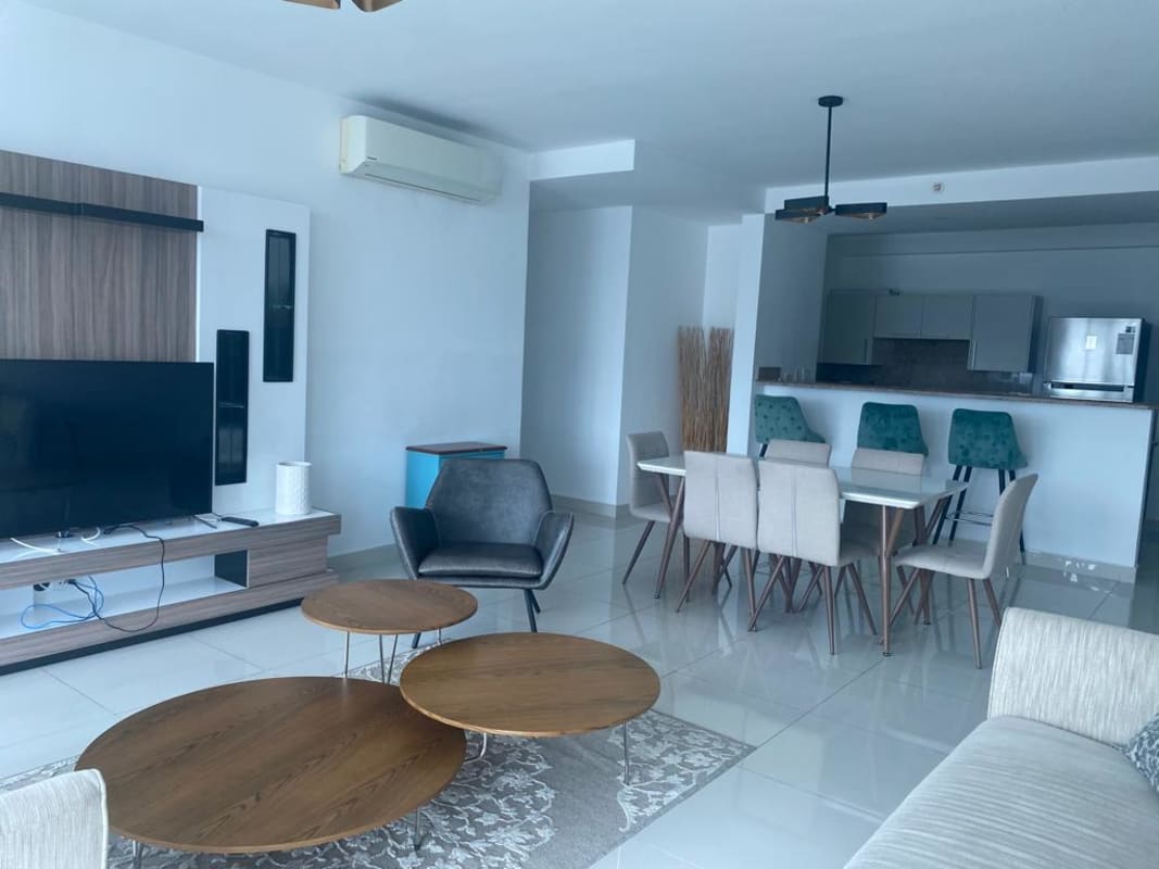 Furnished bedroom with large window and city view PH Costa del Este Panama apartment rental