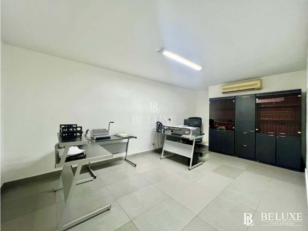 Living room with large windows ceramic floors duplex residence Obarrio Panama