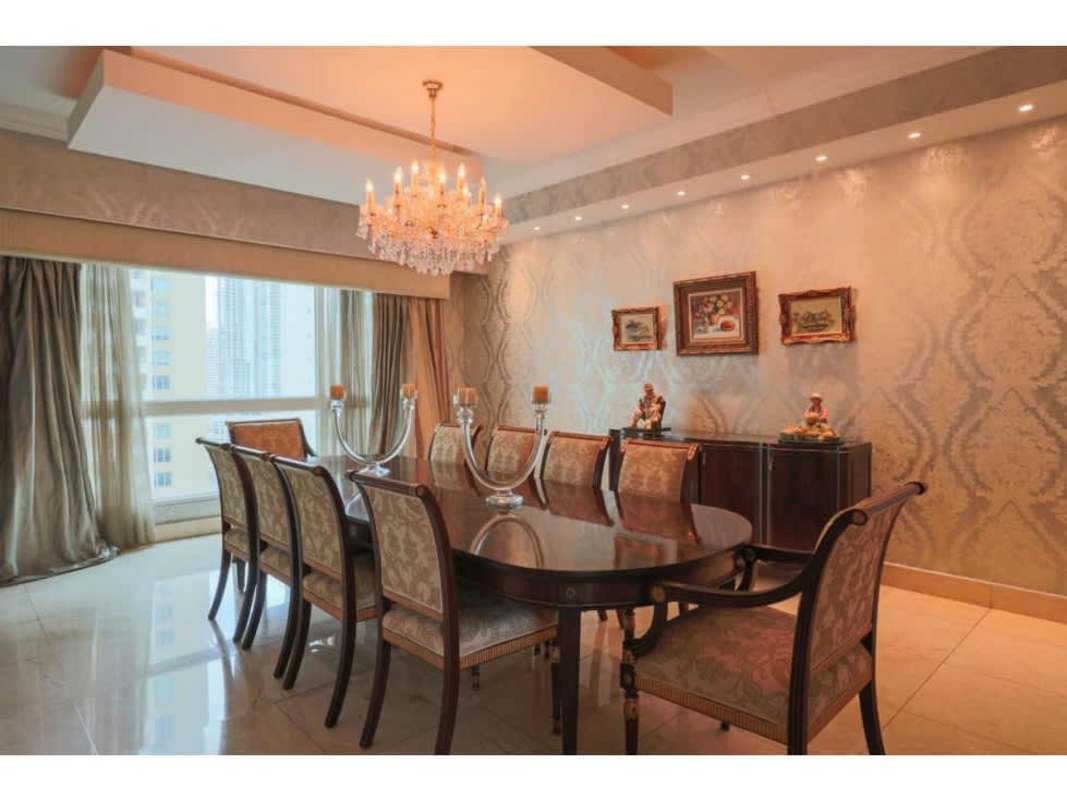 Elegant dining room with city skyline view in Venetian Tower Punta Pacifica