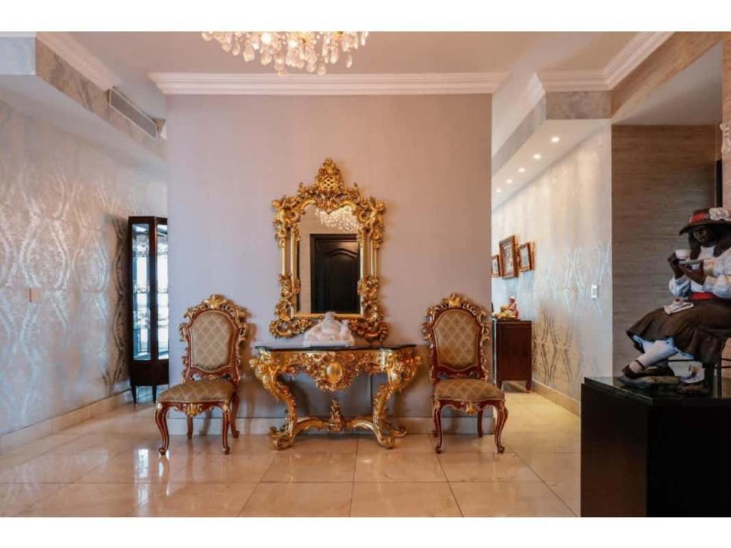 Grand foyer with chandelier and marble flooring in Venetian Tower