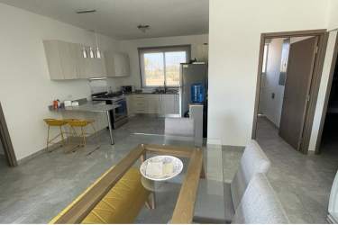 Kitchen with granite countertops, modern appliances in beach house Panama