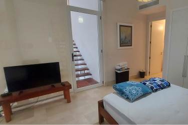 Modern bathroom with tiled walk-in shower at Buenaventura condo beach villa Panama