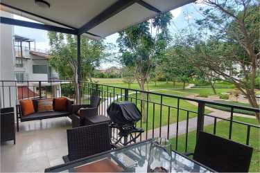 Fully equipped kitchen with island, granite counters and appliances in Buenaventura Condo Panama