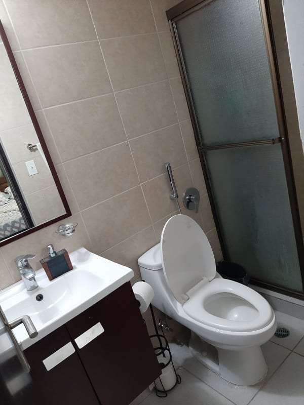 Modern bathroom with glass shower enclosure PH Parque Lefevre Panama