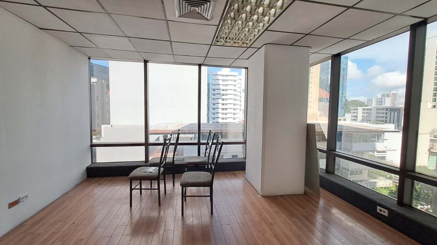 Floor to ceiling curved windows city skyline Edificio Vallarino Panama