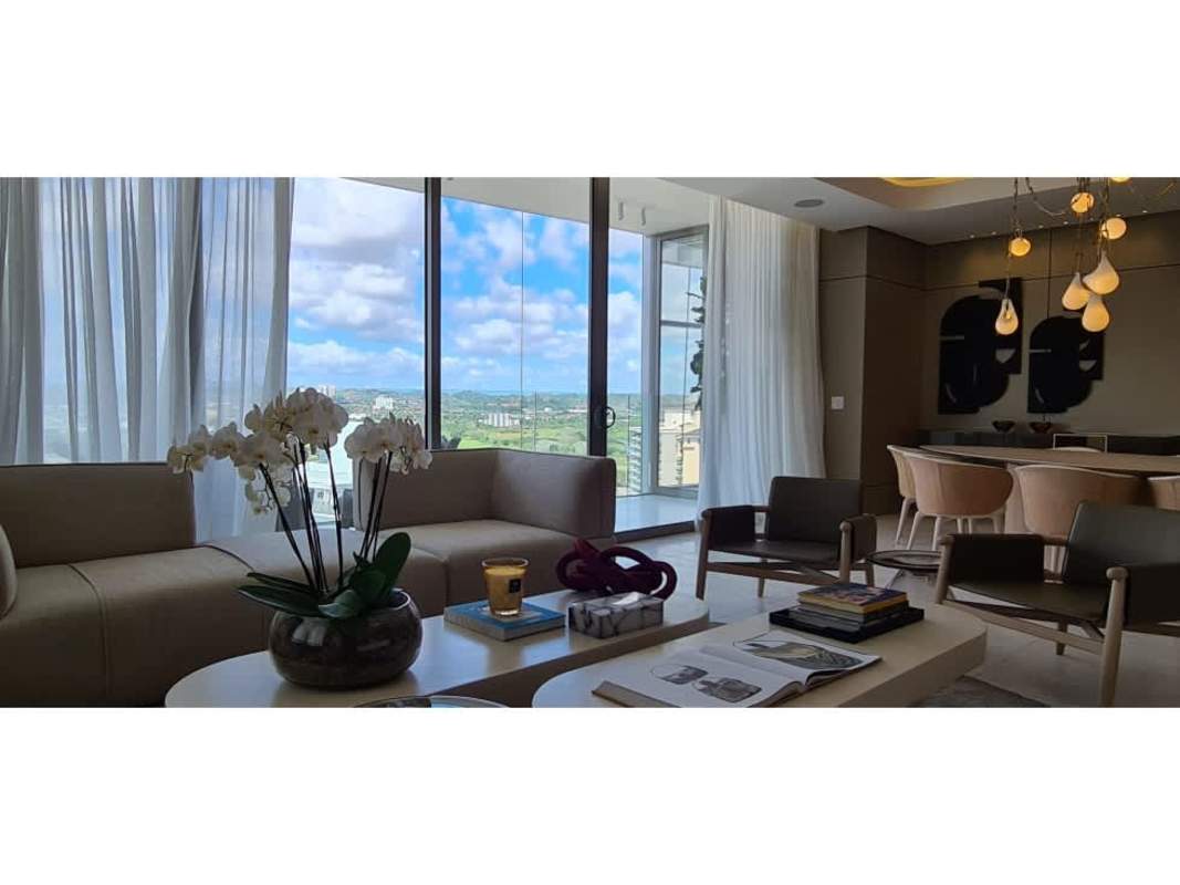 Modern dining area with panoramic windows overlooking Jack Nicklaus golf course, La Maison Fendi Panama