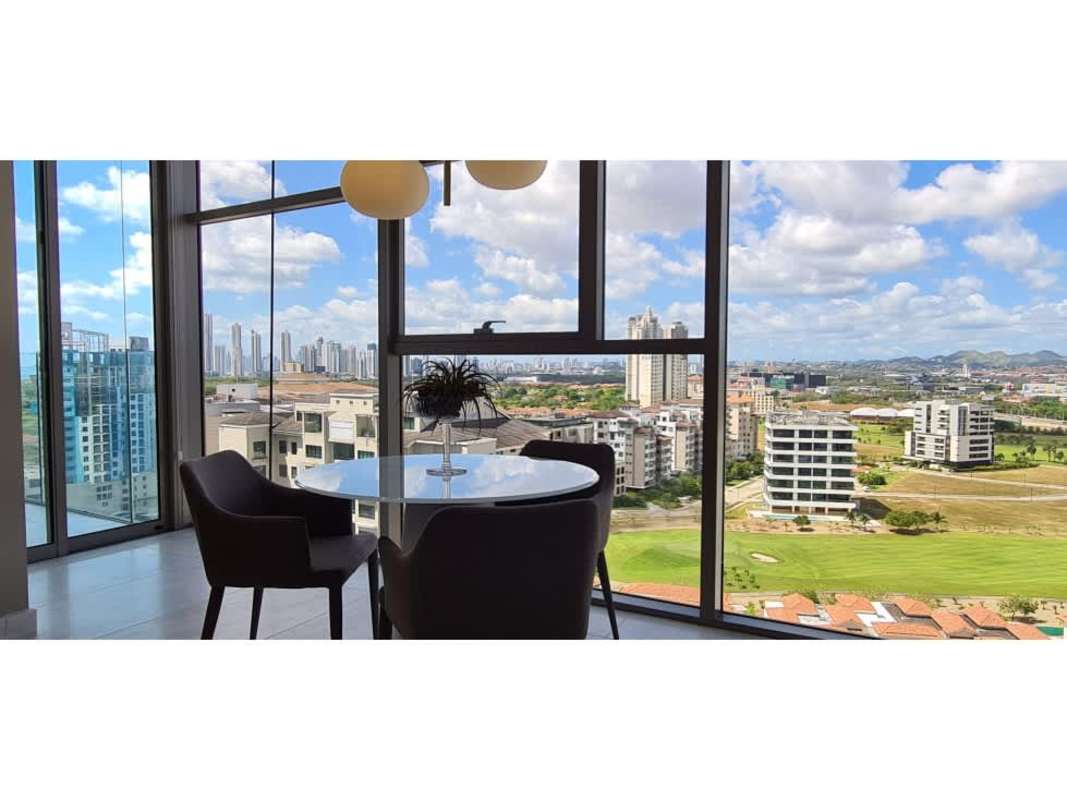 Private balcony with glass railings overlooking ocean, golf fairways and Panama skyline at La Maison by Fendi