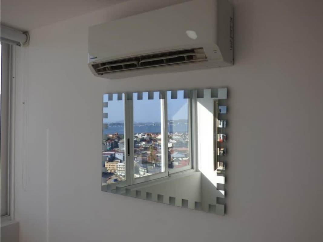 Open plan living room dining with city ocean views PH Bayview Avenida Balboa Panama