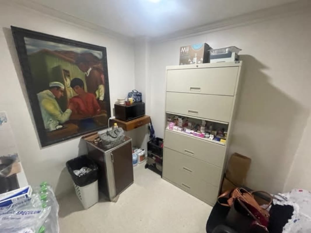 Storage closet with boxes and shelves inside PH Consultorios Medicos Paitilla