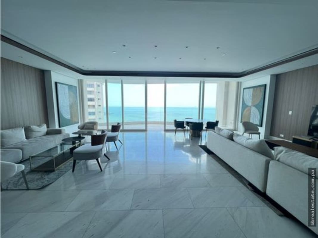 Modern bathroom featuring double vanity, marble finishes, and glass shower at PH The Towers Panama