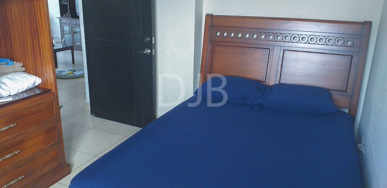 Modern lobby with bamboo wall accents and seating PH San Francisco Tower Panama City