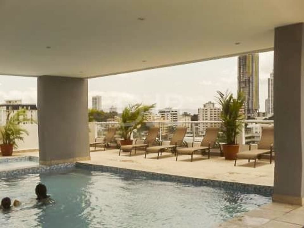 Rooftop swimming pool area with city skyline at PH San Francisco Tower Panama
