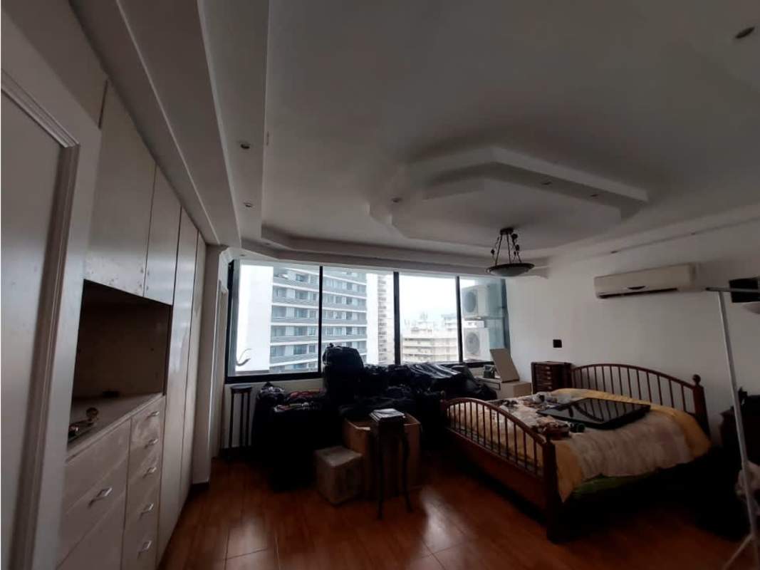 Bright bedroom with large window tray ceiling built-in closet Bayside Tower Punta Paitilla