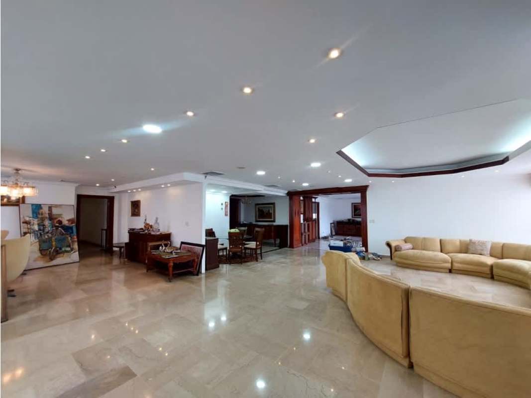 Elegant living and dining space with marble floors and modern lighting in Bayside Tower Punta Paitilla Panama