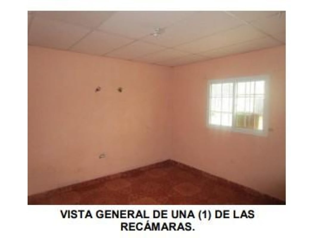 Bedroom with pink walls window with security bars tiled floor Santa Rita Pacora Panama