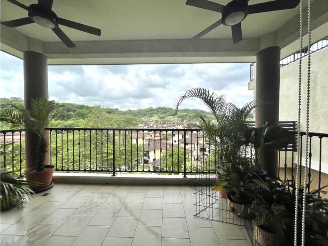 Master bedroom with balcony access overlooking tropical gardens in PH Embassy Club Clayton Panama